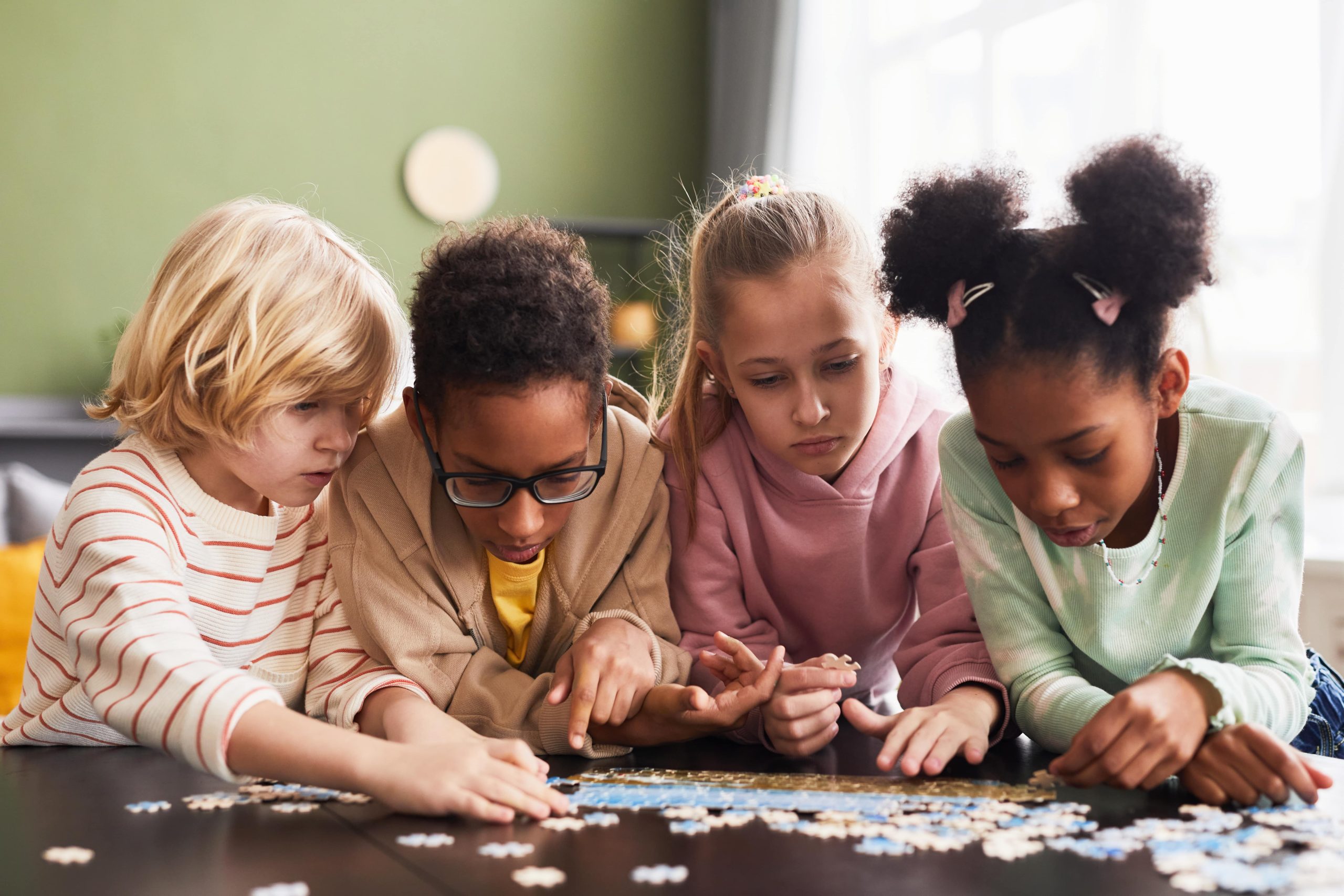 group-of-kids-playing-with-puzzle-2022-02-22-04-26-18-utc-min